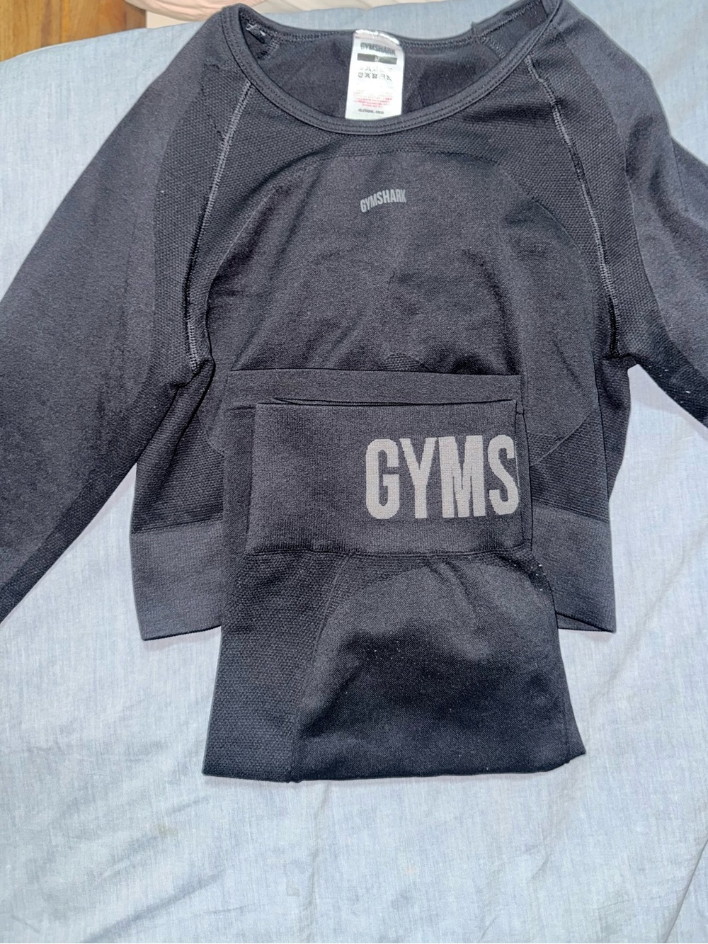Gymshark Black Long Sleeve Athletic Top with matching black shorts